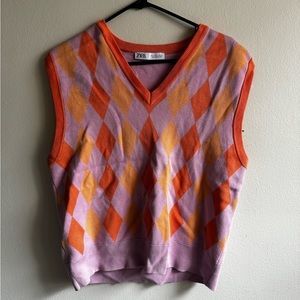 Pink and orange sweater vest